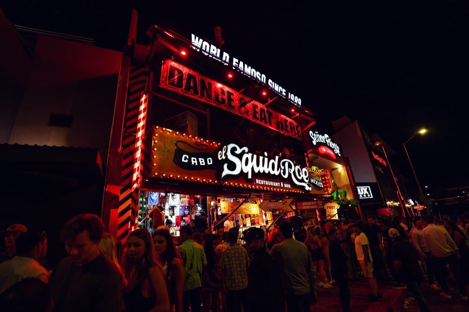 El Squid Roe lit up at night in downtown Cabo San Lucas — the flagship club of the Cabo Hospitality family and the Cabo Party Access meeting point